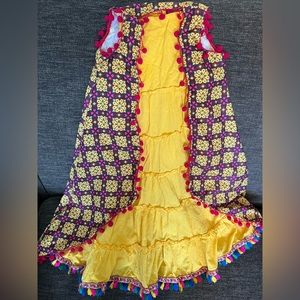Beautiful, FUN dress with pompom edged cover